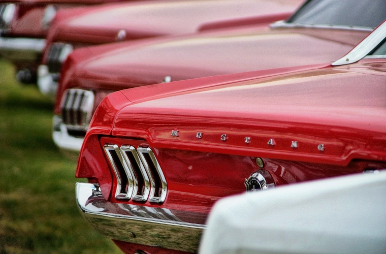 1960s Ford Mustangs - photo by Darren Nunis on Unsplash.com